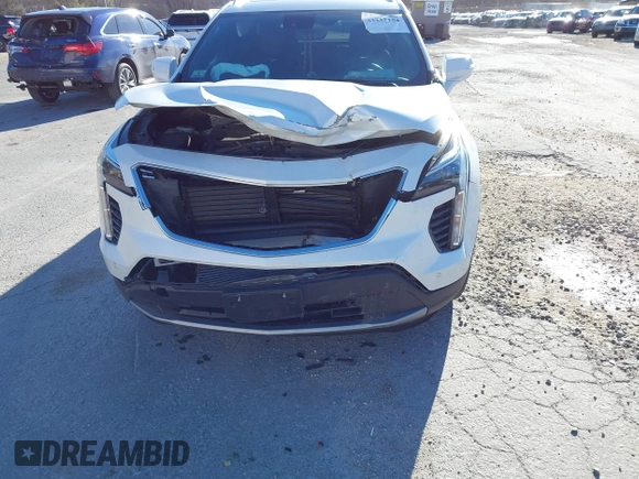 2022 Cadillac XT4 AWD Premium Luxury with VIN 1GYFZDR41NF105299, listed as a IAAI auction lot 41257154 with 34,904 mi miles and . Bid and sale history available at carsss.com. Image 6.
