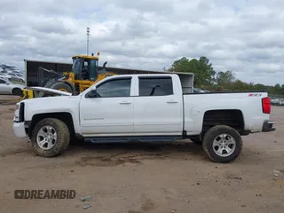 2018 Chevrolet Silverado 1500 LT with VIN 3GCUKREC3JG375591, listed as a IAAI auction lot 40887974 with 72,453 mi miles. Bid and sale history available at carsss.com. Image 13.