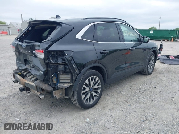 2020 Ford Escape Titanium with VIN 1FMCU9J97LUA35212, listed as a IAAI auction lot 42347274 with 50,419 mi miles and . Bid and sale history available at DreamBid. Image 4.
