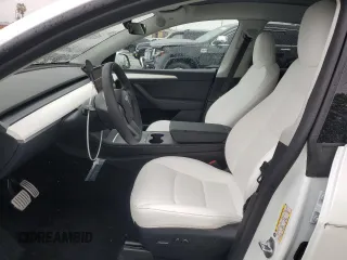 2023 Tesla Model Y Performance with VIN 7SAYGDEF1PF809654, listed as a Copart auction lot 43981915 with 16,401 mi miles and Salvage Title. Bid and sale history available at DreamBid. Image 7.
