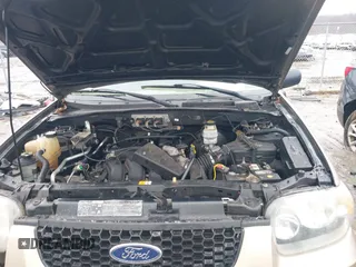 2007 Ford Escape Limited with VIN 1FMYU04137KA67003, listed as a IAAI auction lot 41663853 with 193,651 mi miles. Bid and sale history available at carsss.com. Image 10.