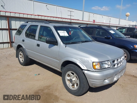 2001 Isuzu Rodeo S with VIN 4S2DM58WX14352481, listed as a IAAI auction lot 41796652 with 162,696 mi miles and . Bid and sale history available at DreamBid. Image 1.