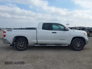 2016 Toyota Tundra SR z VIN 5TFRM5F10GX097792, wystawiony jako IAAI lot #41516069 z przebiegiem 199 598 mil mil oraz . Historia ofert i sprzedaży dostępna na DreamBid. Obrazek 13.