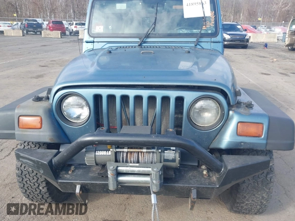 1997 Jeep Wrangler SE with VIN 1J4FY29P0VP522005, listed as a IAAI auction lot 41895863 with 196,614 mi miles. Bid and sale history available at carsss.com. Image 6.
