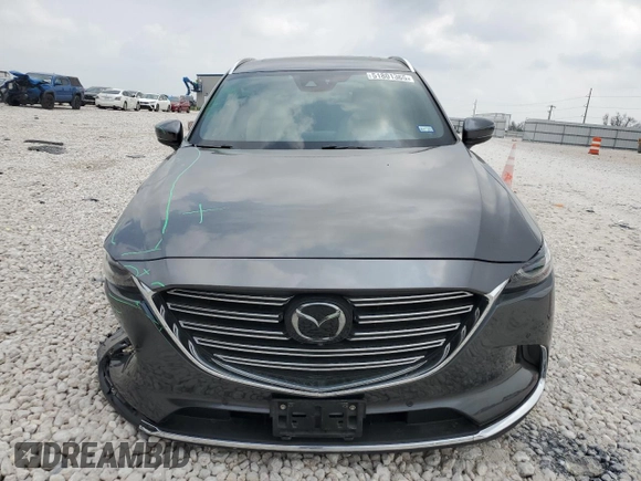2019 Mazda CX-9 Grand Touring z VIN JM3TCADY9K0300284, wystawiony jako Copart lot #51801365 z przebiegiem 53 550 mil mil oraz Szkoda całkowita • Salvage title. Historia ofert i sprzedaży dostępna na DreamBid. Obrazek 5.