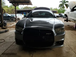 2012 Dodge Charger SRT8 with VIN 2C3CDXEJ1CH240058, listed as a Copart auction lot 73943004 with 72,013 mi miles and Salvage Title. Bid and sale history available at carsss.com. Image 5.