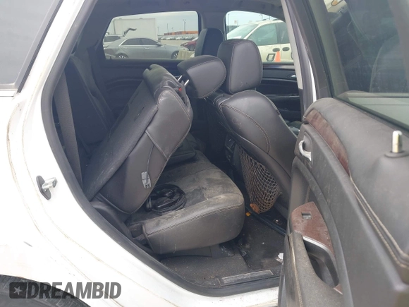 2012 Cadillac SRX Premium Collection with VIN 3GYFNCE32CS579256, listed as a IAAI auction lot 42660666 with 125,236 mi miles and . Bid and sale history available at DreamBid. Image 8.