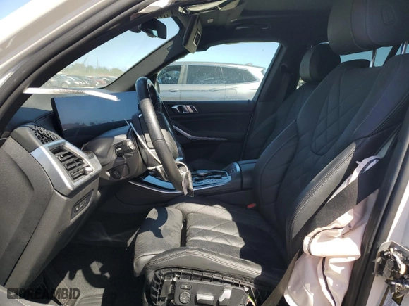 2024 BMW X5 sDrive40i with VIN 5UX13EU00R9S43348, listed as a Copart auction lot 49572065 with 0 mi miles and Salvage Title. Bid and sale history available at carsss.com. Image 7.