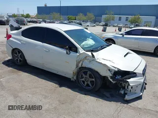 2021 Subaru WRX z VIN JF1VA1A68M9801794, wystawiony jako IAAI lot #42421444 z przebiegiem 100 920 mil mil oraz . Historia ofert i sprzedaży dostępna na DreamBid. Obrazek 1.