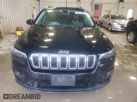 2019 Jeep Cherokee Altitude with VIN 1C4PJMLX5KD386597, listed as a Copart auction lot 59132655 with 129,243 mi miles and Salvage title. Bid and sale history available at DreamBid. Image 5.