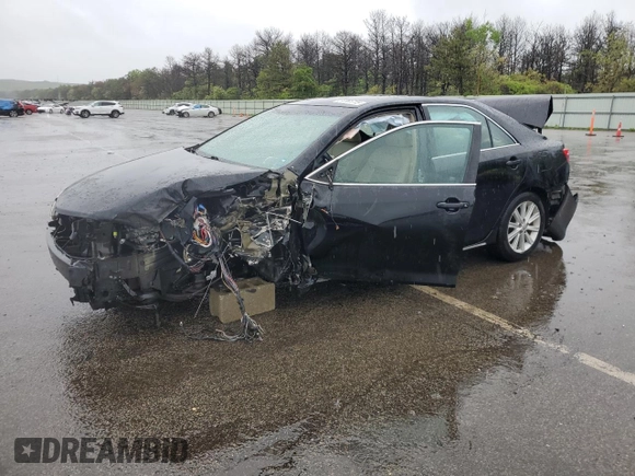 2012 Toyota Camry XLE z VIN 4T1BD1FK8CU001921, wystawiony jako Copart lot #57861715 z przebiegiem Nie podano mil oraz Szkoda całkowita • Salvage title. Historia ofert i sprzedaży dostępna na DreamBid. Obrazek 1.