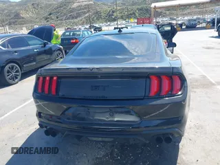 2021 Ford Mustang GT z VIN 1FA6P8CF4M5149580, wystawiony jako IAAI lot #41878355 z przebiegiem 60 028 mil mil oraz . Historia ofert i sprzedaży dostępna na DreamBid. Obrazek 16.