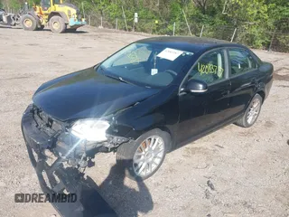2008 Volkswagen Jetta S z VIN 3VWJM71K88M021296, wystawiony jako IAAI lot #42083787 z przebiegiem 170 777 mil mil oraz . Historia ofert i sprzedaży dostępna na DreamBid. Obrazek 2.