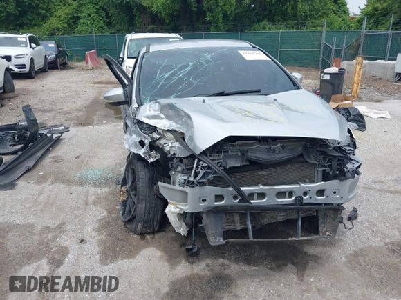 2016 Ford Focus SE z VIN 1FADP3F22GL373756, wystawiony jako IAAI lot #42369795 z przebiegiem 99 646 mil mil oraz . Historia ofert i sprzedaży dostępna na DreamBid. Obrazek 15.