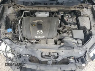 2016 Mazda CX-5 Touring with VIN JM3KE2CY9G0661308, listed as a Copart auction lot 51853485 with 131,595 mi miles and Salvage Title. Bid and sale history available at carsss.com. Image 13.