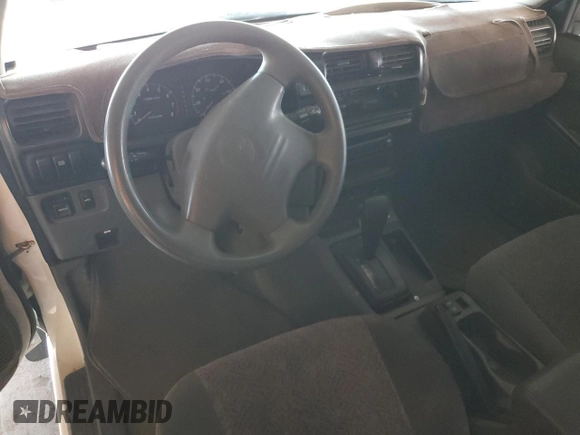 2000 Isuzu Rodeo S z VIN 4S2CK58W3Y4323965, wystawiony jako Copart lot #61189435 z przebiegiem 211 726 mil mil oraz Szkoda całkowita • Salvage title. Historia ofert i sprzedaży dostępna na DreamBid. Obrazek 8.