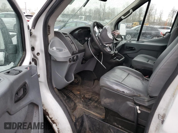 2019 Ford Transit Cargo with VIN 1FTBW3XM7KKA39855, listed as a Copart auction lot 85120994 with 121,522 mi miles and Salvage Title. Bid and sale history available at DreamBid. Image 8.