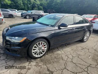 2014 Audi A6 Prestige with VIN WAUHGAFCXEN008586, listed as a Copart auction lot 60304815 with 133,577 mi miles and Salvage title. Bid and sale history available at DreamBid. Image 1.