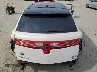 2012 Lincoln MKT EcoBoost with VIN 2LMHJ5AT4CBL53611, listed as a Copart auction lot 46493425 with 77,072 mi miles and Salvage Title. Bid and sale history available at DreamBid. Image 6.