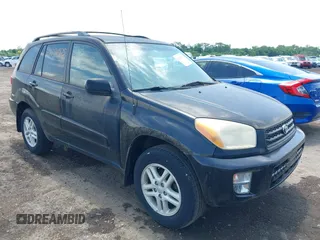 2002 Toyota RAV4 with VIN JTEGH20V320051697, listed as a IAAI auction lot 42526875 with 128,609 mi miles and . Bid and sale history available at DreamBid. Image 1.