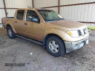 2005 Nissan Frontier SE with VIN 1N6AD07U55C437075, listed as a IAAI auction lot 42844873 with 210,886 mi miles and . Bid and sale history available at DreamBid. Image 1.
