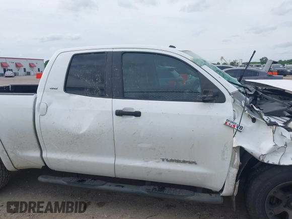 2012 Toyota Tundra with VIN 5TFUW5F16CX225421, listed as a IAAI auction lot 42210783 with 207,025 mi miles and . Bid and sale history available at DreamBid. Image 13.