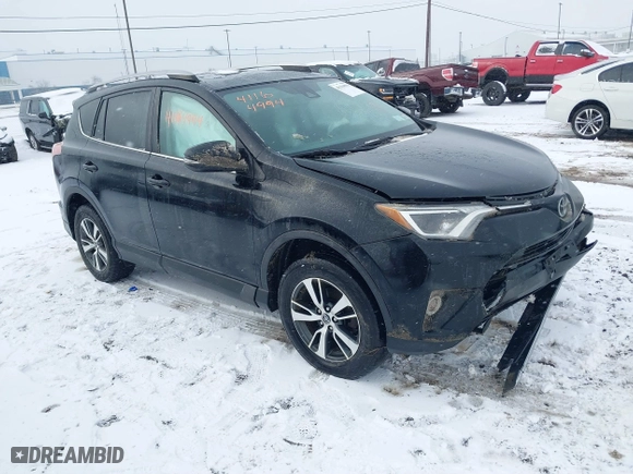 2018 Toyota RAV4 XLE with VIN 2T3RFREV8JW851250, listed as a IAAI auction lot 41164994 with 63,005 mi miles. Bid and sale history available at carsss.com. Image 1.