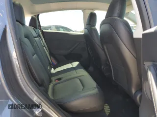 2023 Tesla Model Y Long Range z VIN 7SAYGDEE8PA185193, wystawiony jako Copart lot #48706215 z przebiegiem 10 451 mil mil oraz Szkoda całkowita • Salvage title. Historia ofert i sprzedaży dostępna na DreamBid. Obrazek 11.