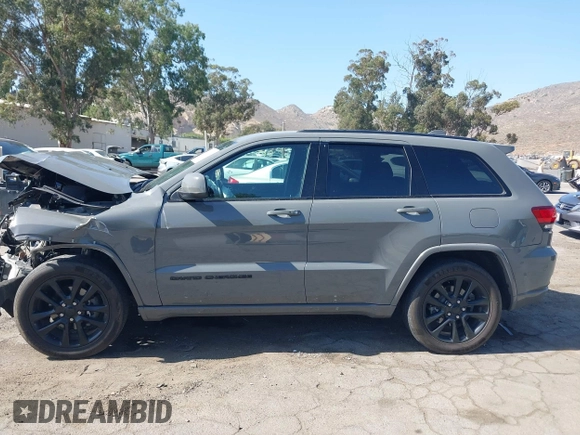 2020 Jeep Grand Cherokee Laredo E with VIN 1C4RJEAG3LC247027, listed as a IAAI auction lot 42538279 with 97,601 mi miles and . Bid and sale history available at DreamBid. Image 14.