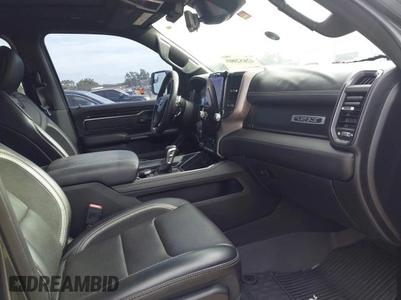 2021 Ram 1500 TRX with VIN 1C6SRFU98MN820577, listed as a IAAI auction lot 42652005 with 43,429 mi miles and . Bid and sale history available at DreamBid. Image 5.