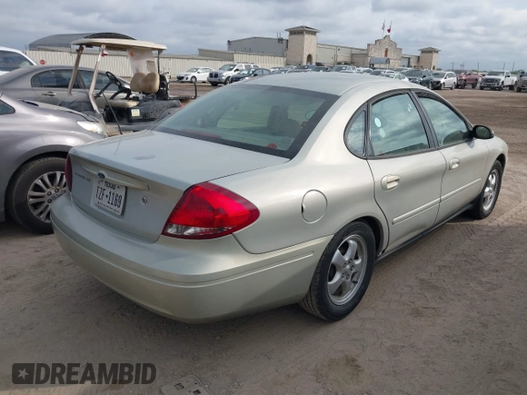 2006 Ford Taurus SE with VIN 1FAFP53U16A221651, listed as a IAAI auction lot 42065261 with 159,411 mi miles. Bid and sale history available at carsss.com. Image 4.