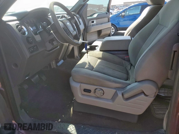 2009 Ford F-150 STX with VIN 1FTRX12879KC61168, listed as a Copart auction lot 52399755 with 197,923 mi miles and Clean Title. Bid and sale history available at carsss.com. Image 7.