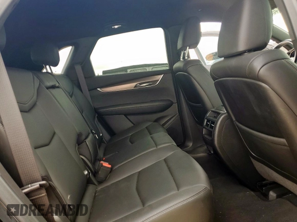 2021 Cadillac XT5 FWD Luxury with VIN 1GYKNAR42MZ120996, listed as a Copart auction lot 63314655 with 49,977 mi miles and Salvage title. Bid and sale history available at DreamBid. Image 11.