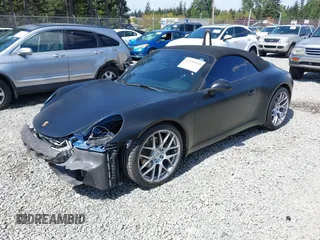 2014 Porsche 911 Carrera z VIN WP0CA2A94ES140857, wystawiony jako IAAI lot #42159010 z przebiegiem 46 230 mil mil oraz . Historia ofert i sprzedaży dostępna na DreamBid. Obrazek 19.