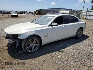 2014 BMW 7 Series 740Li with VIN WBAYE4C57ED137727, listed as a Copart auction lot 51847244 with 136,495 mi miles and Salvage Title. Bid and sale history available at carsss.com. Image 1.
