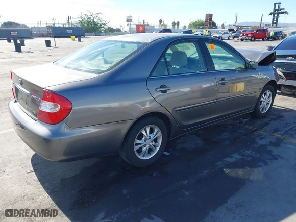 2004 Toyota Camry LE with VIN 4T1BF32K44U578104, listed as a IAAI auction lot 40789804 with NaN miles. Bid and sale history available at carsss.com. Image 4.