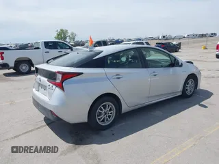 2020 Toyota Prius L Eco with VIN JTDKARFU5L3117287, listed as a IAAI auction lot 42202426 with 122,870 mi miles and . Bid and sale history available at DreamBid. Image 4.