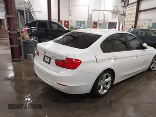 2014 BMW 3 Series 328i with VIN WBA3C1C52EK112194, listed as a IAAI auction lot 41694770 with 139,609 mi miles. Bid and sale history available at carsss.com. Image 4.