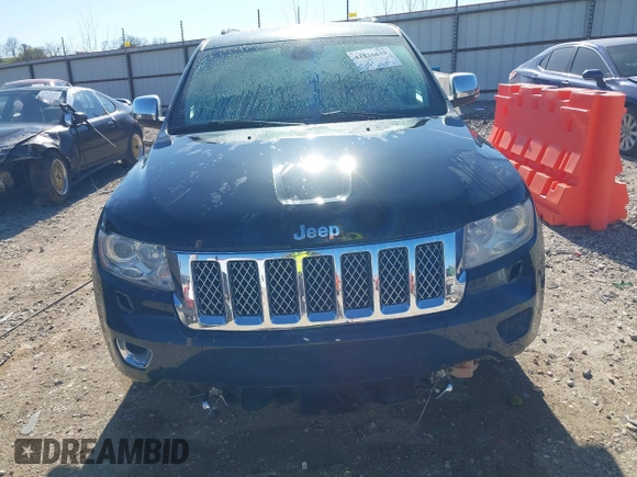 2013 Jeep Grand Cherokee Overland with VIN 1C4RJFCT1DC654653, listed as a IAAI auction lot 41826619 with 124,283 mi miles. Bid and sale history available at carsss.com. Image 13.