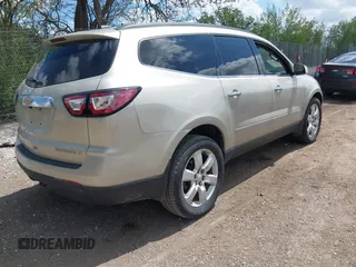2016 Chevrolet Traverse LT z VIN 1GNKVGKD3GJ195932, wystawiony jako IAAI lot #42243260 z przebiegiem 122 449 mil mil oraz . Historia ofert i sprzedaży dostępna na DreamBid. Obrazek 4.