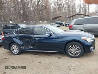 2015 Infiniti Q70 with VIN JN1BY1PRXFM832185, listed as a IAAI auction lot 41801058 with 101,503 mi miles and . Bid and sale history available at DreamBid. Image 13.