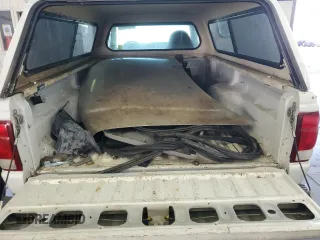 2000 Ford Ranger XL with VIN 1FTYR10C2YPB63860, listed as a Copart auction lot 65560005 with 124,721 mi miles and Clean title. Bid and sale history available at DreamBid. Image 10.
