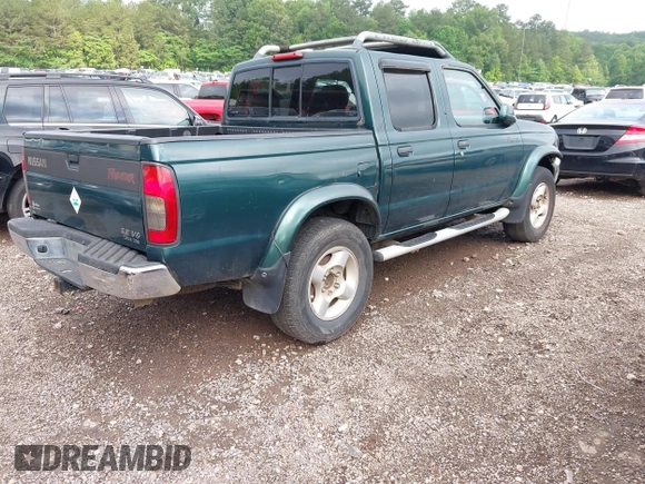 2000 Nissan Frontier XE with VIN 1N6ED27T5YC429406, listed as a IAAI auction lot 42150671 with 303,869 mi miles and . Bid and sale history available at DreamBid. Image 4.