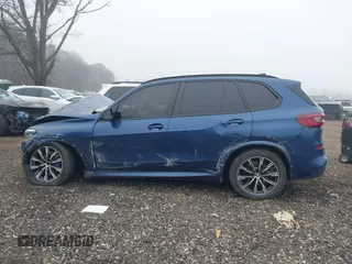 2023 BMW X5 xDrive40i z VIN 5UXCR6C08P9N95511, wystawiony jako IAAI lot #41901359 z przebiegiem 55 662 mil mil oraz . Historia ofert i sprzedaży dostępna na DreamBid. Obrazek 14.
