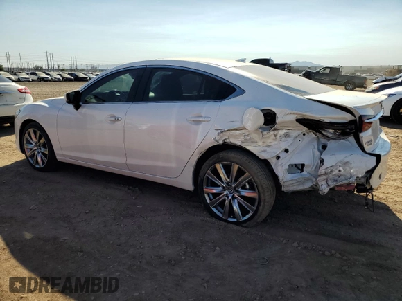 2021 Mazda 6 Signature with VIN JM1GL1XY5M1614601, listed as a Copart auction lot 73769893 with 22,617 mi miles and . Bid and sale history available at DreamBid. Image 2.