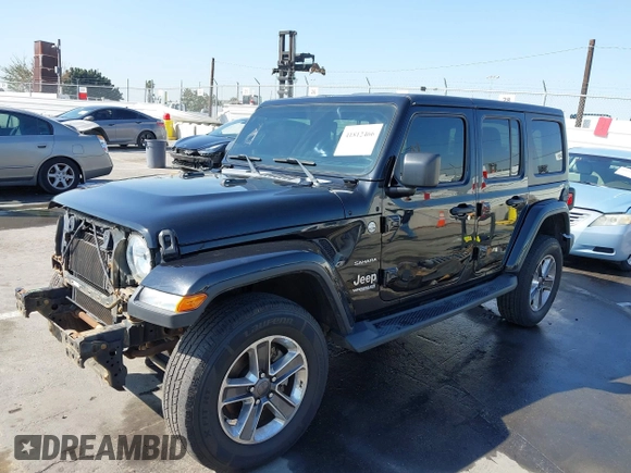 2020 Jeep Wrangler Unlimited Sahara with VIN 1C4HJXEN7LW230214, listed as a IAAI auction lot 41812466 with 59,004 mi miles. Bid and sale history available at carsss.com. Image 18.