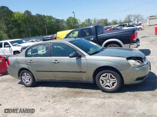 2005 Chevrolet Malibu with VIN 1G1ZS52F45F256302, listed as a IAAI auction lot 41964761 with 198,233 mi miles. Bid and sale history available at carsss.com. Image 13.