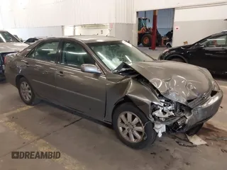 2003 Toyota Camry LE with VIN 4T1BE32K13U754348, listed as a IAAI auction lot 41765418 with 194,227 mi miles and . Bid and sale history available at DreamBid. Image 1.