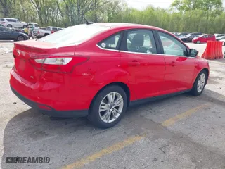 2012 Ford Focus SEL with VIN 1FAHP3H27CL387807, listed as a IAAI auction lot 42056056 with 113,194 mi miles. Bid and sale history available at carsss.com. Image 4.