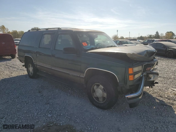 1997 GMC Suburban with VIN 3GKFK16R7VG514905, listed as a Copart auction lot 77410934 with NaN miles and Salvage Title. Bid and sale history available at carsss.com. Image 4.